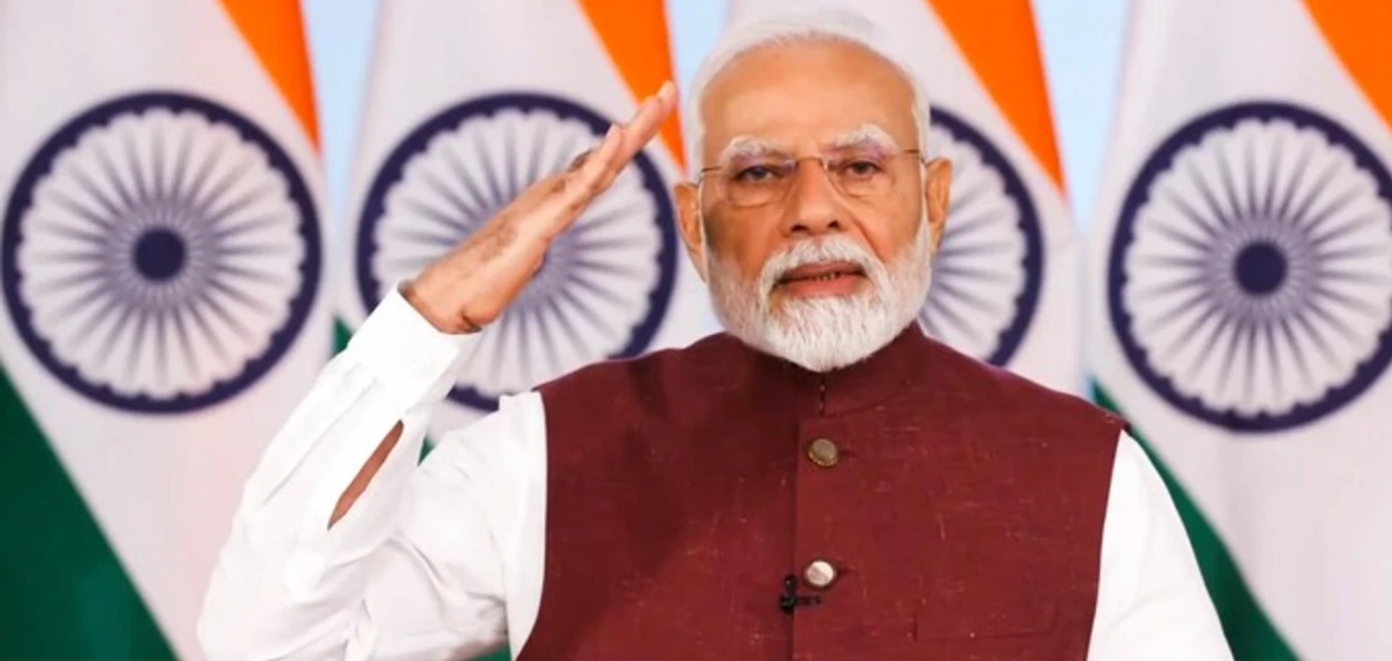 দেশবাসীক সম্বোধন কৰাৰ সময়ত প্ৰধানমন্ত্ৰী মোদী