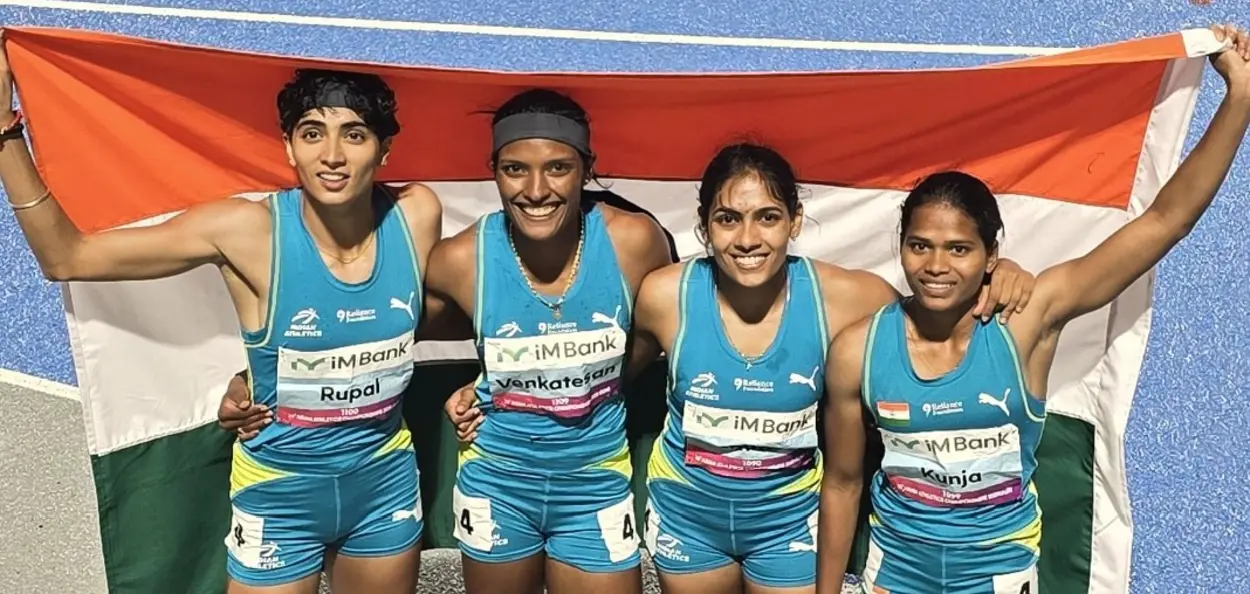 এছিয়ান এথলেটিকছ চেম্পিয়নশ্বিপৰ স্বৰ্ণ পদকৰ সৈতে কুঞ্জা ৰাজিতা (সোঁফালে)