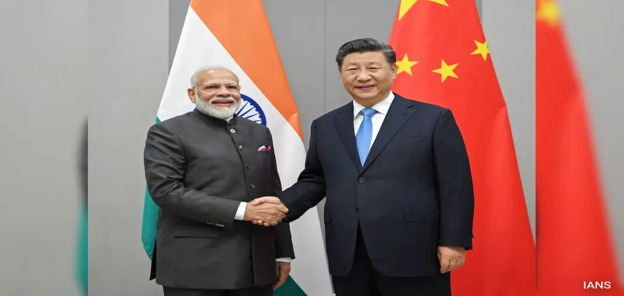 ৰাছিয়াত চীনৰ প্ৰধানমন্ত্ৰী ঝি জিনপিঙৰ সৈতে প্ৰধানমন্ত্ৰী নৰেন্দ্ৰ মোদী (ফাইল ফটো)