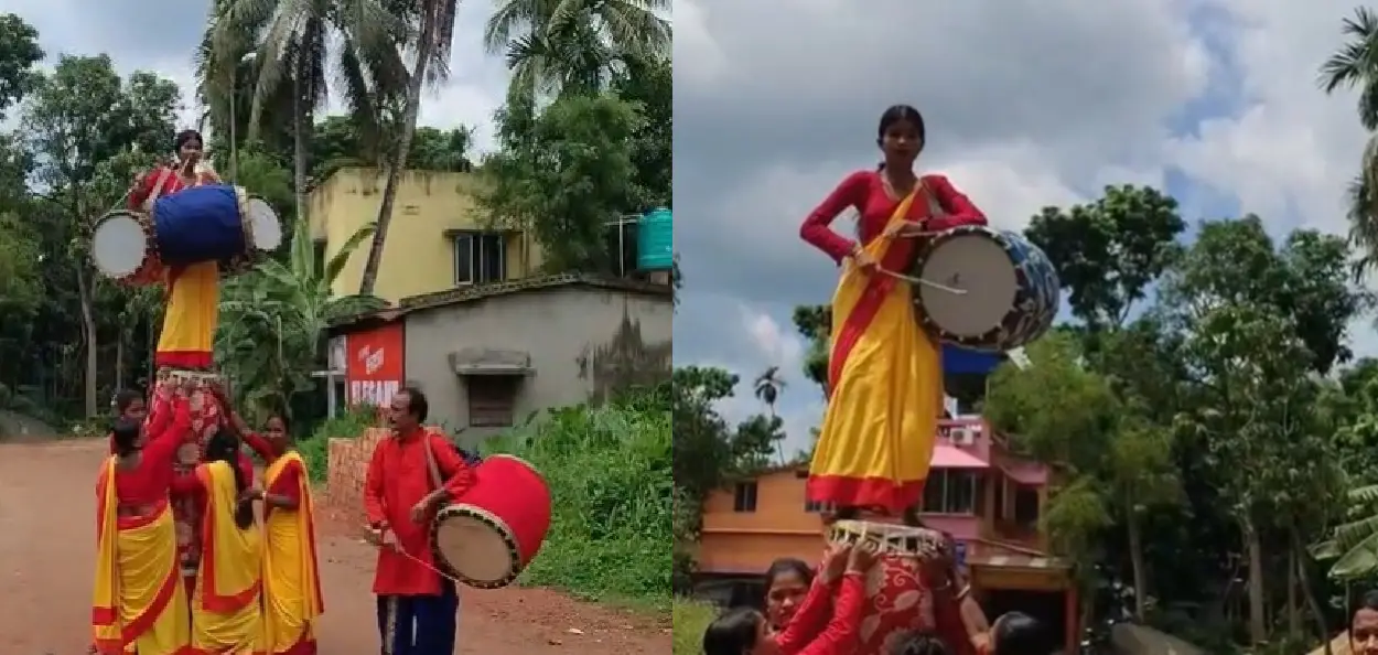 ঢাকৰ ওপৰত থিয় হৈ চমক সৃষ্টি বংগৰ মহিলা ঢুলীয়াৰ