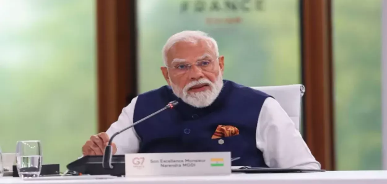 প্ৰধানমন্ত্ৰী নৰেন্দ্ৰ মোদী